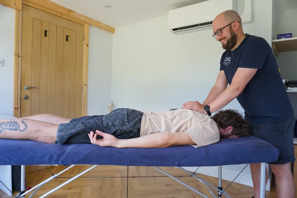 Relaxing back massage on the treatment table