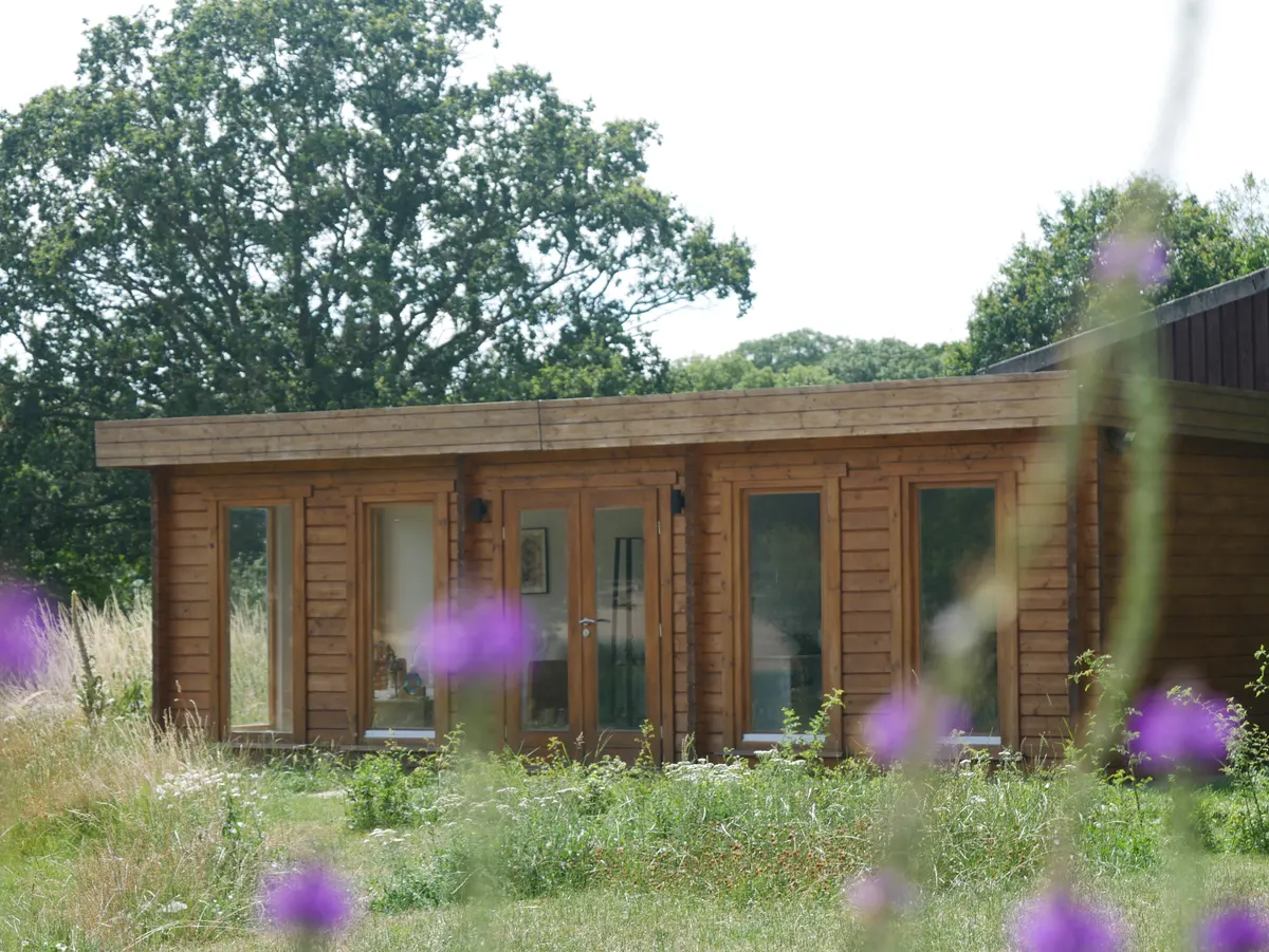 The Fully Fit Therapy clinic cabin in Upleadon, set among wildflower meadows